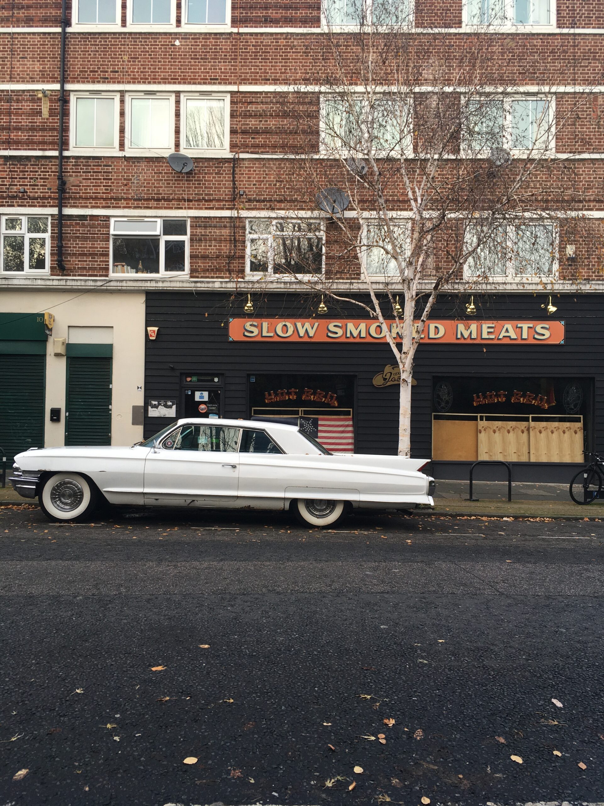 A beautiful vintage American car outside a restaurant at the back of London Bridge station.