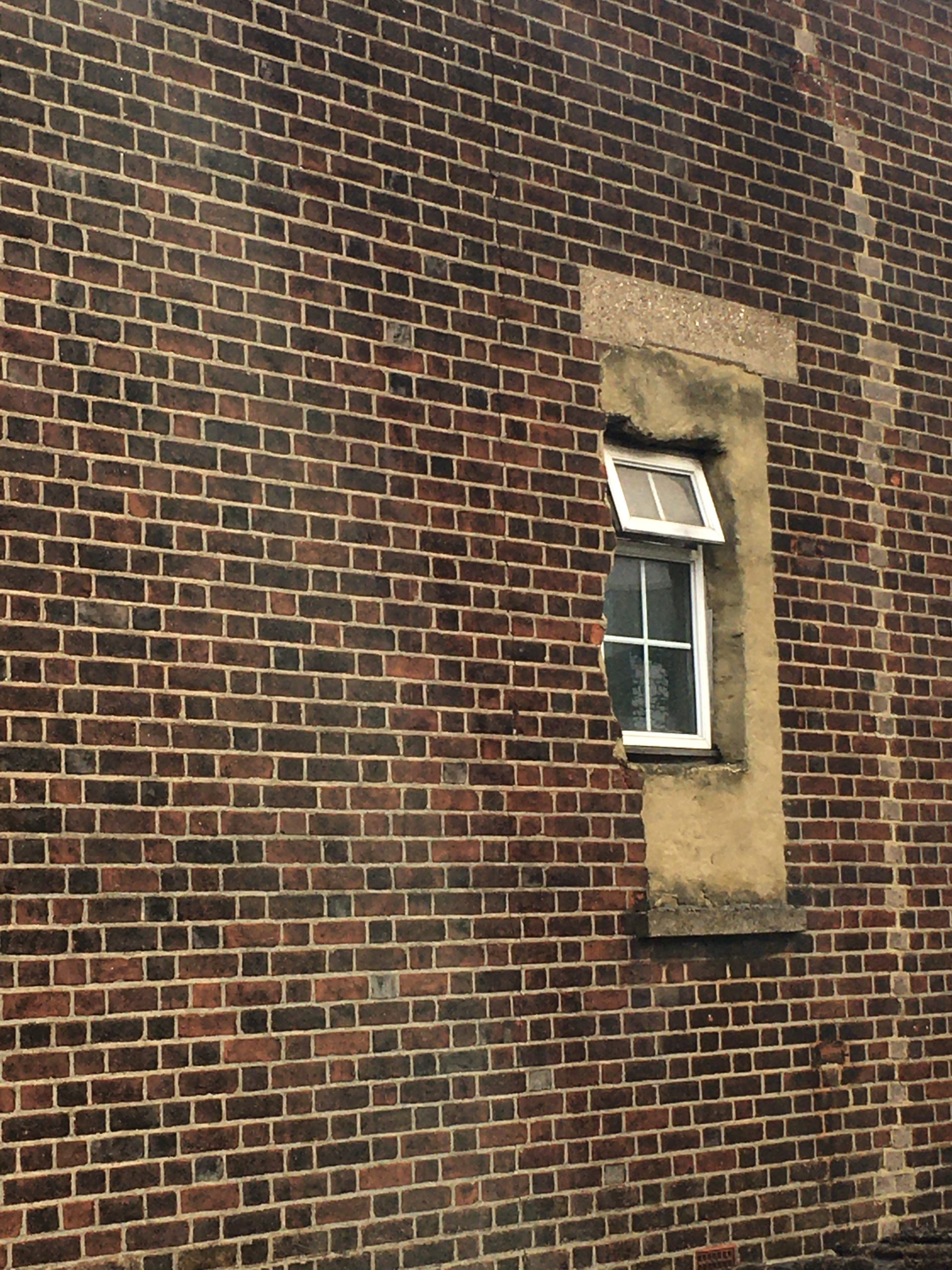 An oddly cut window in South London on my commute.